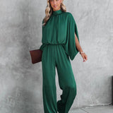 Elegante tuta verde smeraldo con maniche lunghe autunnali