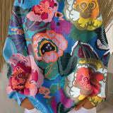 Ida | Maglione con grandi fiori colorati